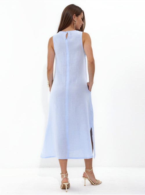 Vestido midi de praia em algodão texturizado com racha hiccup - Kiabi Vestido midi de praia em algodão texturizado com racha hiccup - Kiabi