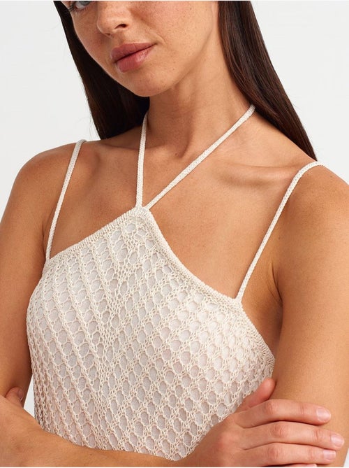 Vestido midi halter texturizado com recorte - Kiabi Vestido midi halter texturizado com recorte - Kiabi