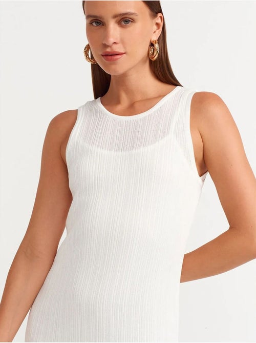 Vestido midi justo sem mangas canelado dilvin - Kiabi Vestido midi justo sem mangas canelado dilvin - Kiabi