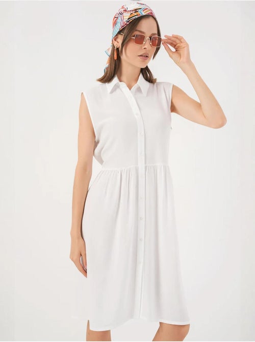 Vestido midi sem mangas com botões e colarinho de camisa bdart - Kiabi Vestido midi sem mangas com botões e colarinho de camisa bdart - Kiabi