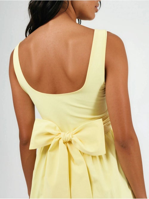 Vestido midi sem mangas com decote arredondado busem - Kiabi Vestido midi sem mangas com decote arredondado busem - Kiabi