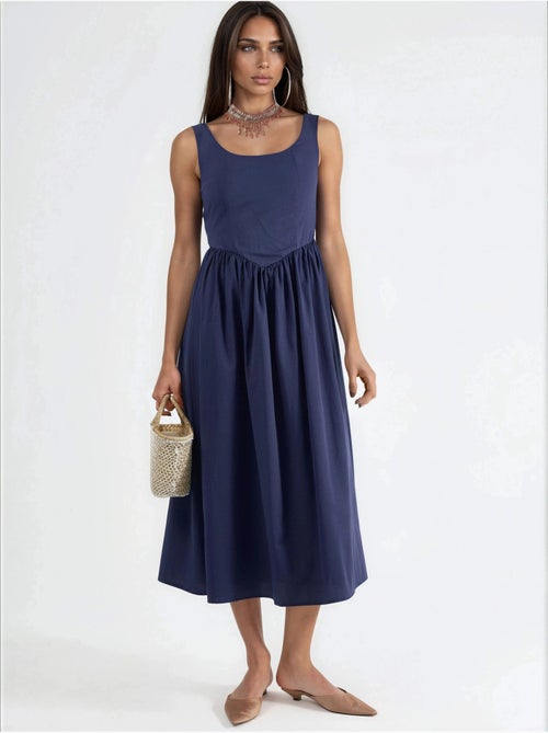 Vestido midi sem mangas com decote arredondado busem - Kiabi Vestido midi sem mangas com decote arredondado busem - Kiabi