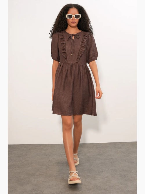 Vestido mini smock feminino em linha a bdart - Kiabi Vestido mini smock feminino em linha a bdart - Kiabi