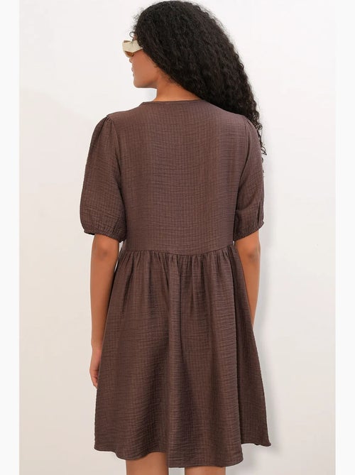 Vestido mini smock feminino em linha a bdart - Kiabi Vestido mini smock feminino em linha a bdart - Kiabi