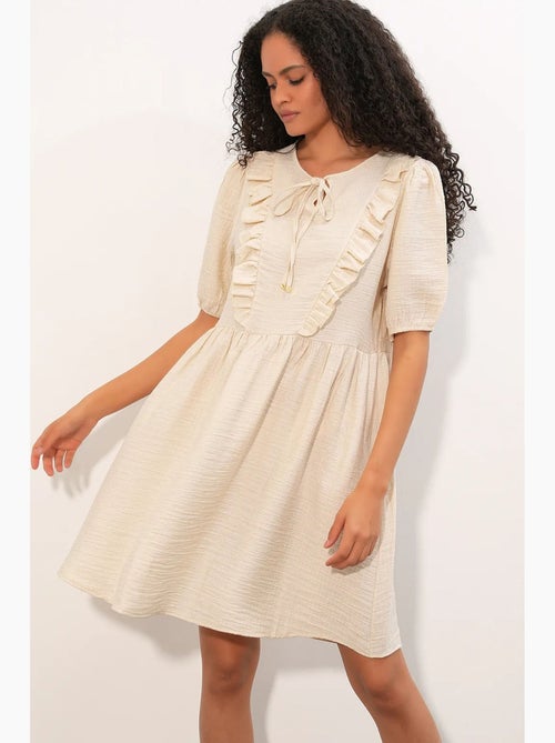Vestido mini smock feminino em linha a bdart - Kiabi Vestido mini smock feminino em linha a bdart - Kiabi