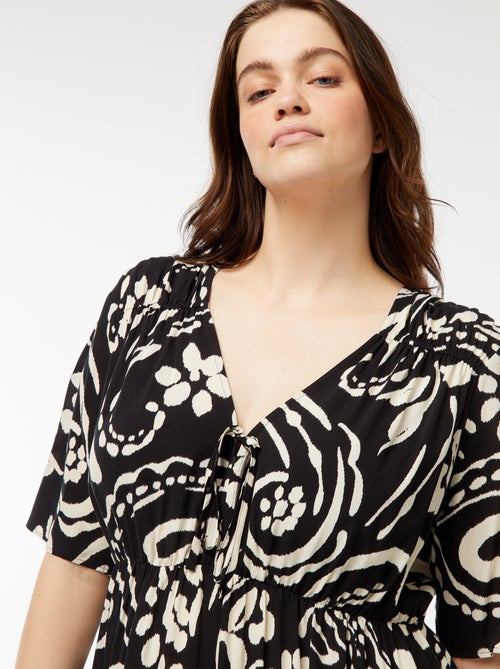 Vestido trapézio estampado com base com folhos - Kiabi