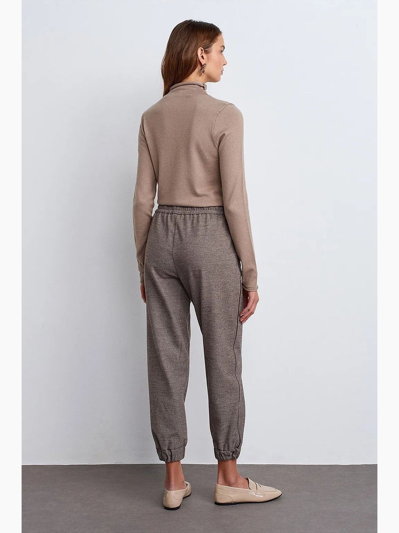 Women's calças jogger em crepe de poliéster dilvin Castanho - Kiabi