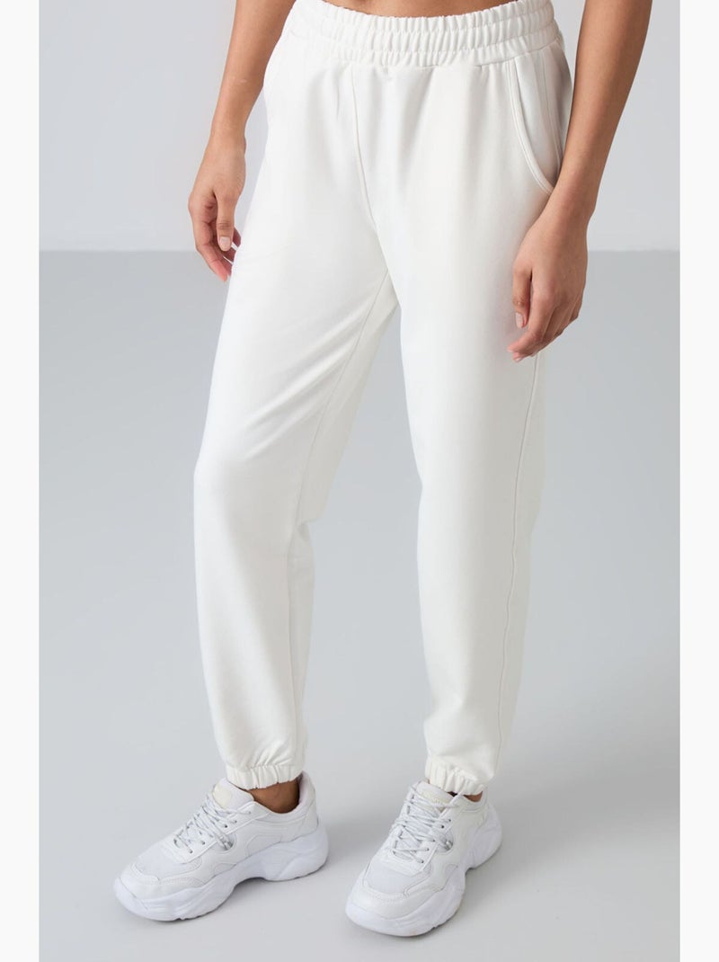 Women's joggers de felpa relaxed de cintura subida tommy Branco - Kiabi