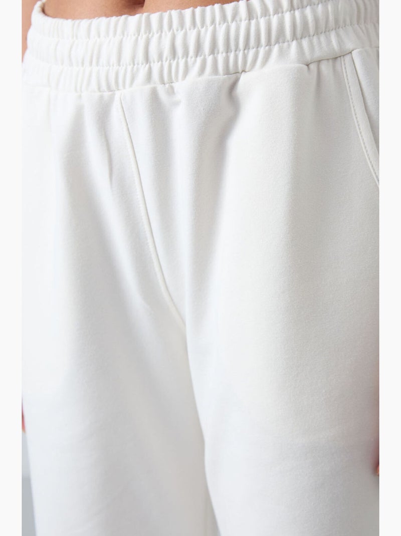 Women's joggers de felpa relaxed de cintura subida tommy Branco - Kiabi