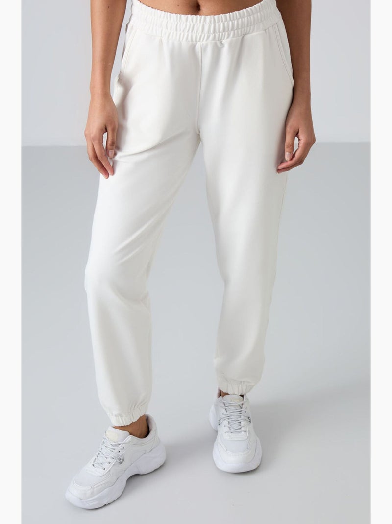 Women's joggers de felpa relaxed de cintura subida tommy Branco - Kiabi