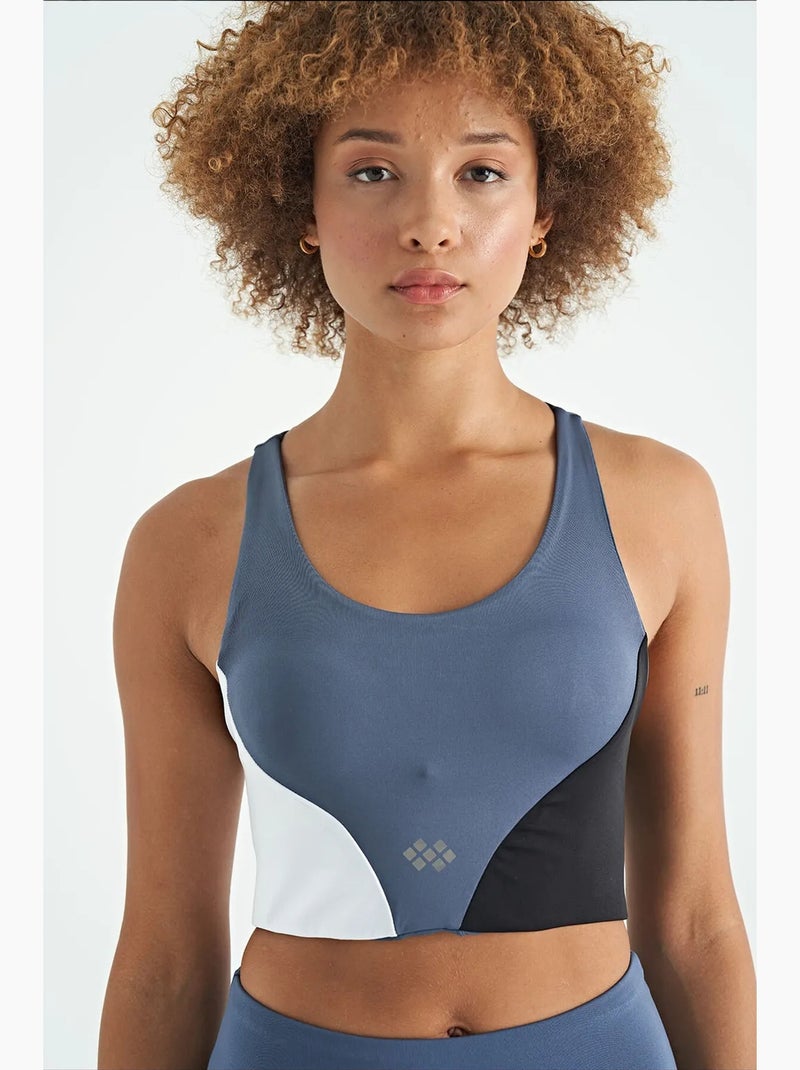 Women's top desportivo curto com blocos de cor tommy Azul Branco Preto - Kiabi