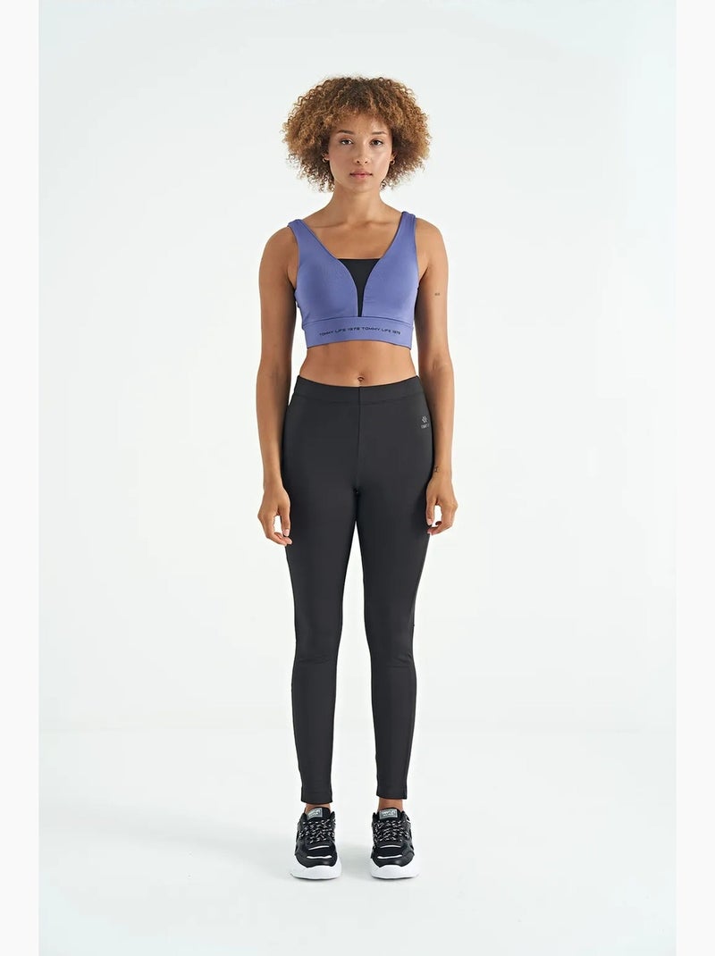 Women's top desportivo curto sem mangas com blocos de cor tommy Azul-Preto - Kiabi