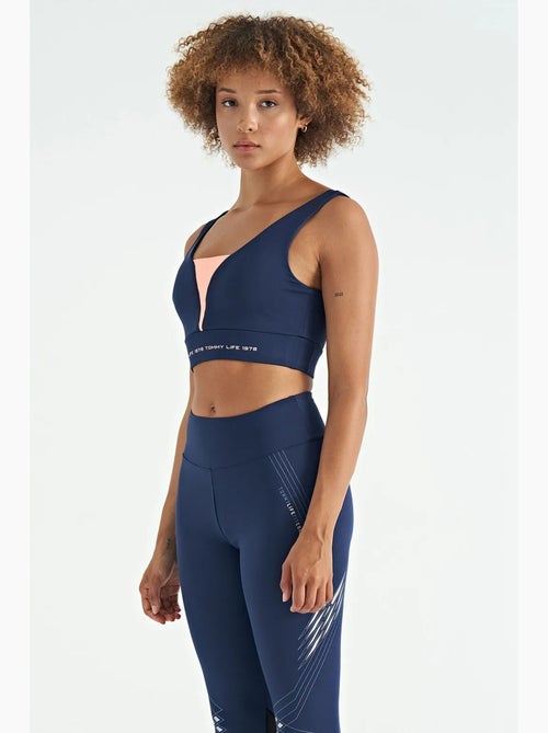 Women's top desportivo curto sem mangas com blocos de cor tommy - Kiabi Women's top desportivo curto sem mangas com blocos de cor tommy - Kiabi